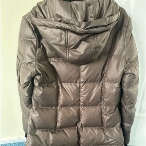 Warm and cozy Designer puffer in Brown. New